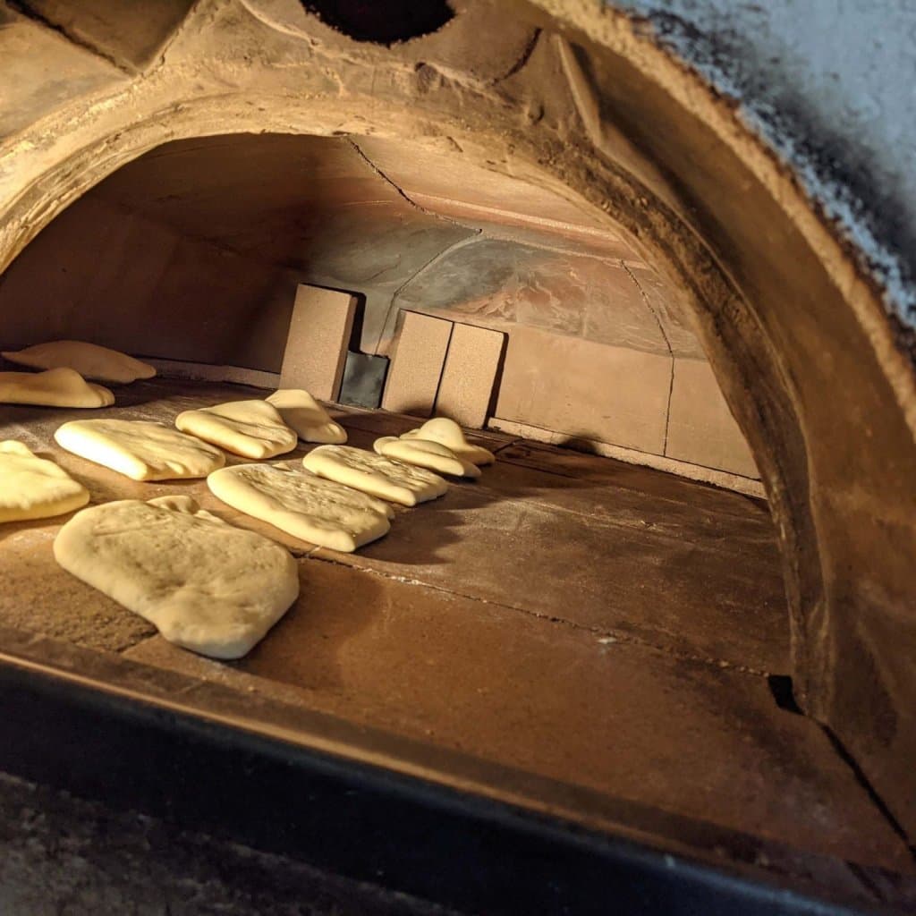 Spice-Trail-Stone-Oven-Bakery-Featured-Image-Stone-Oven-scaled-1-scaled-e1640017533169__FocusFillMaxWyIwLjAwIiwiMC4wMCIsMTAyNCwxMDI0XQ_QualityWzg1XQ.jpg